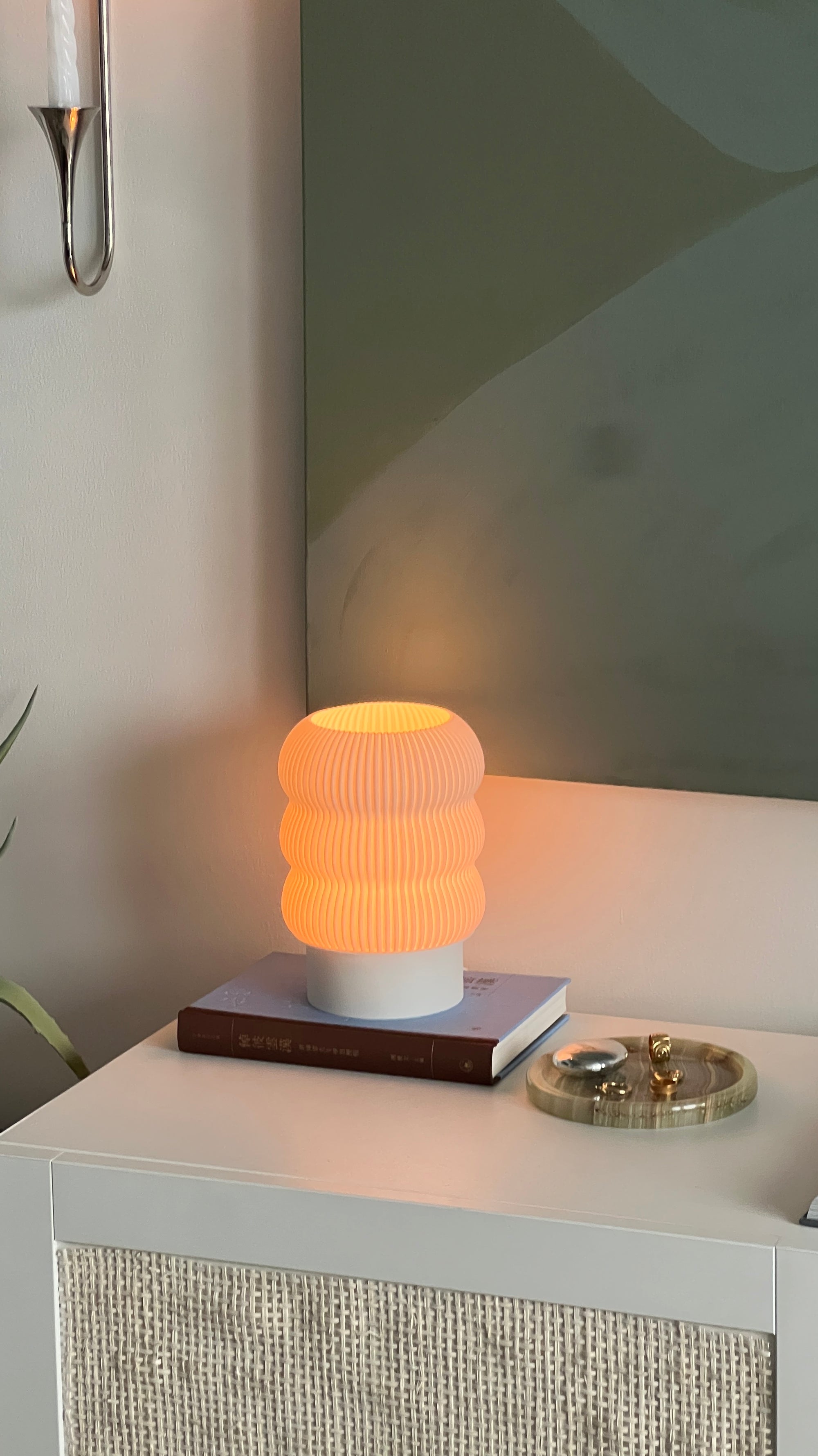 Decorative lamp on a nightstand with a soft glow