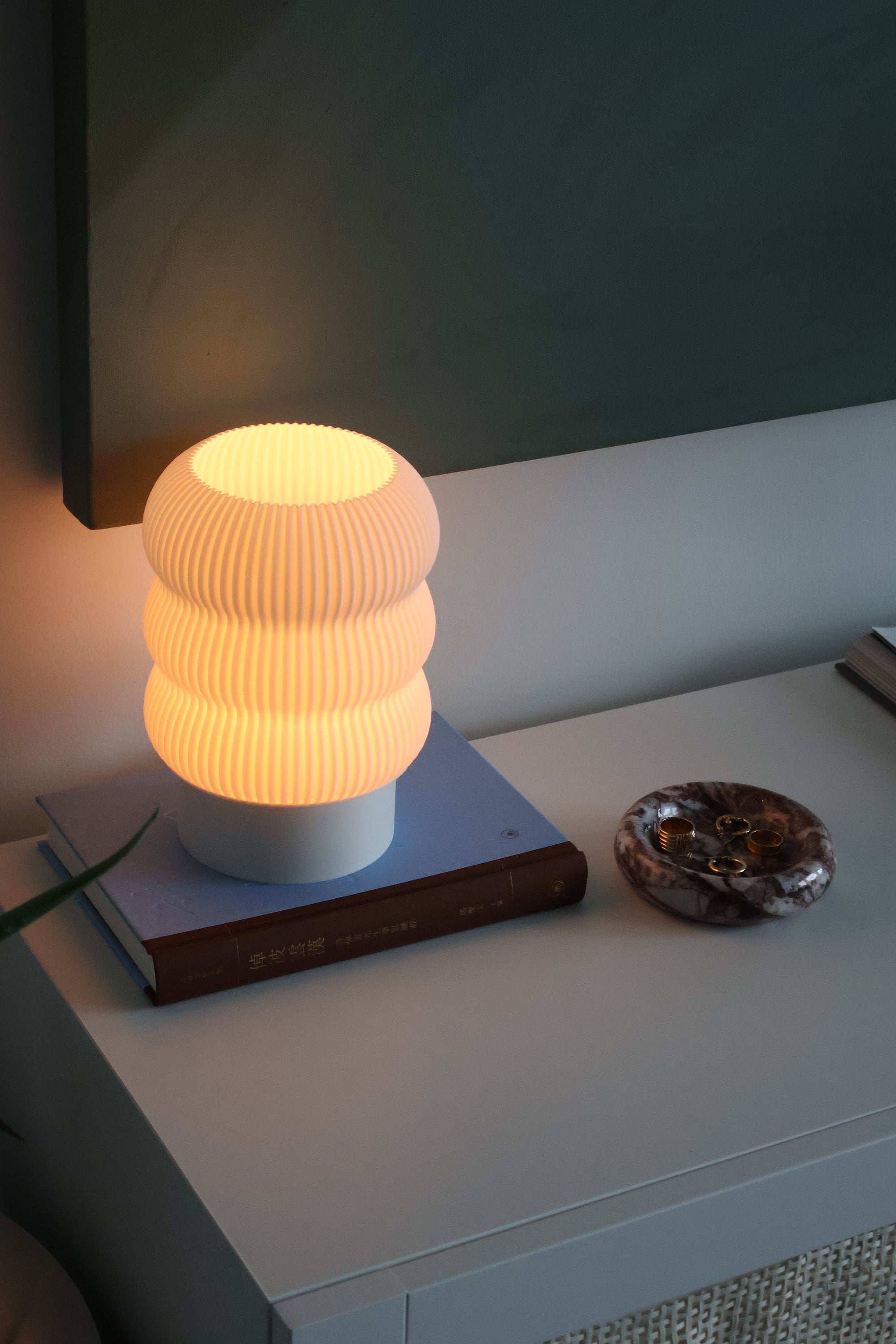 Small lamp on a surface with a blurred background